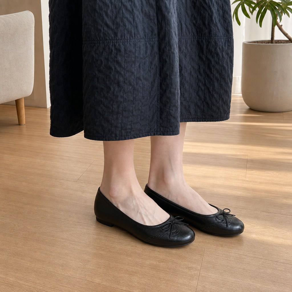 Black cowhide flats worn indoors