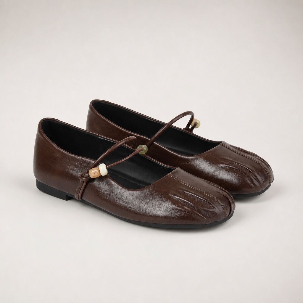 Brown casual flats on a light background