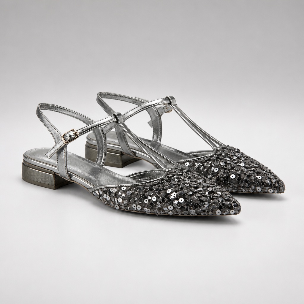 Silver closed toe flat sandals on white background
