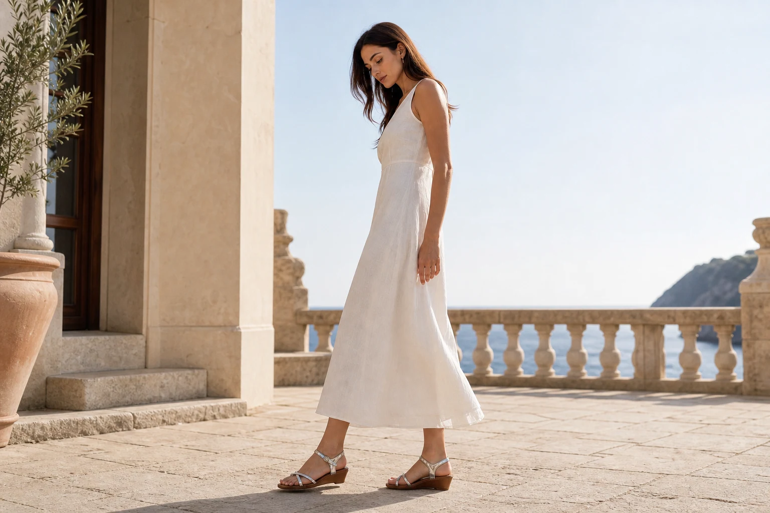 Lifestyle scene showing the full silver square toe wedge sandals