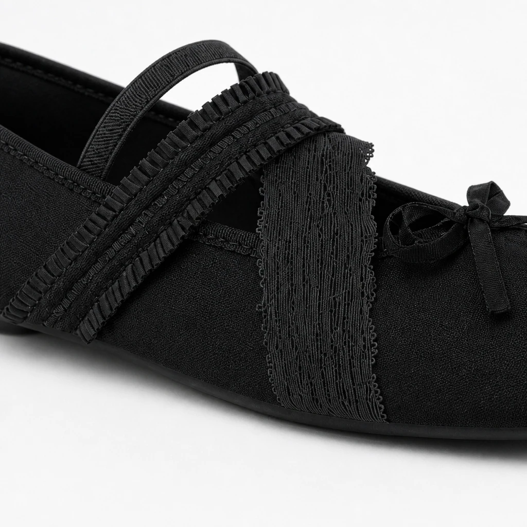 Close-up detail of the strap, bow, and smooth finish on the Mary Jane shoe
