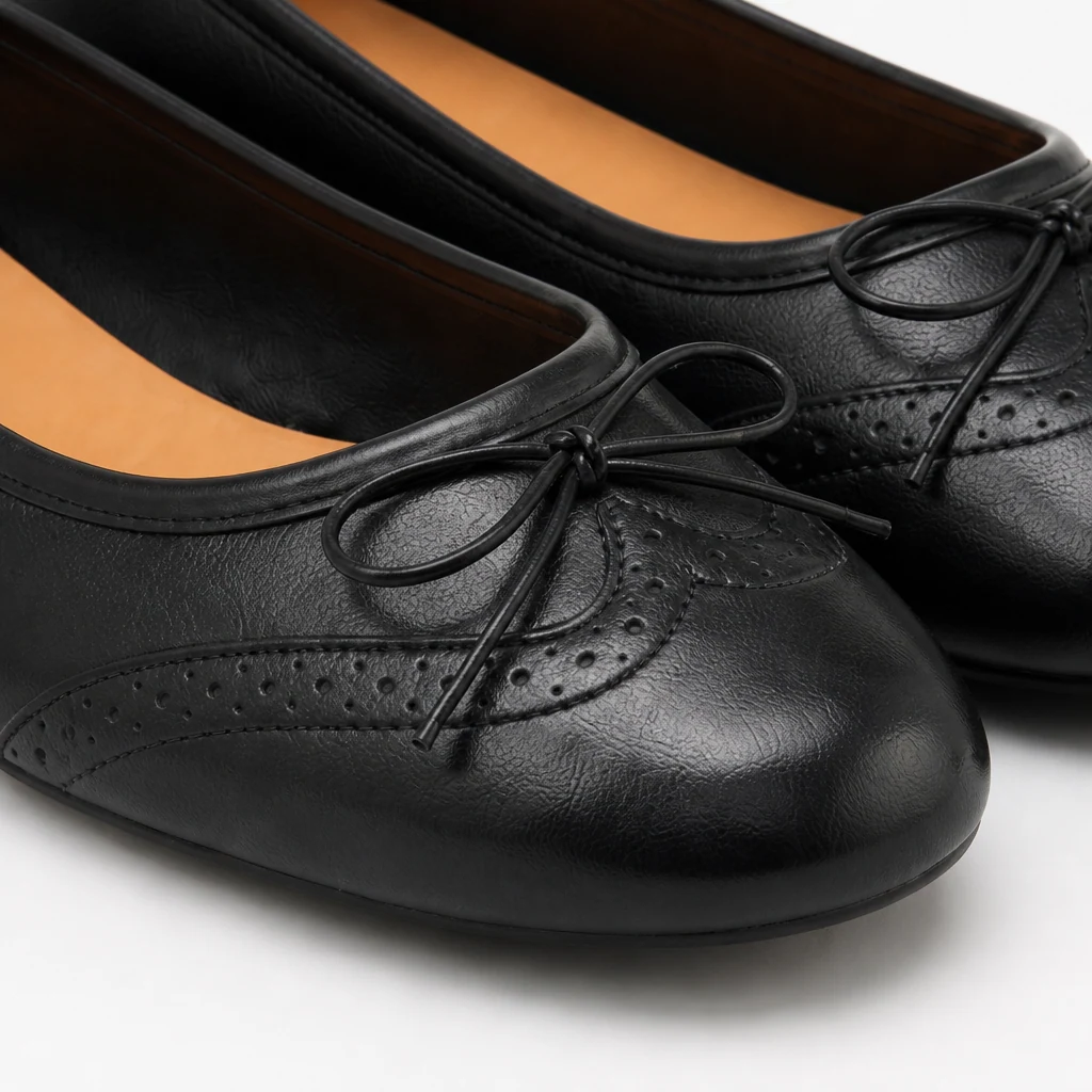 Close-up detail of the cowhide upper and classic flat shoe construction